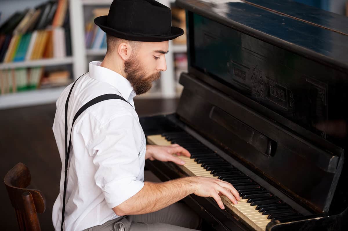 Men playing piano with their penis