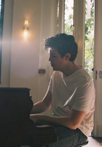 Remme playing piano in the acoustic version of 'Get Older'