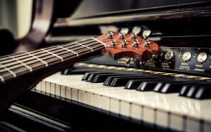 Learning piano vs guitar which one to choose? piano vs guitar
